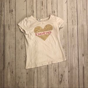 Bebe girl size (10-12) gold embellishment